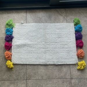 Pom Pom floor mat. NWOT. Never used. Non smoker home.